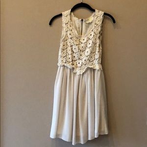 Free people; Staring at Stars ivory mini dress.